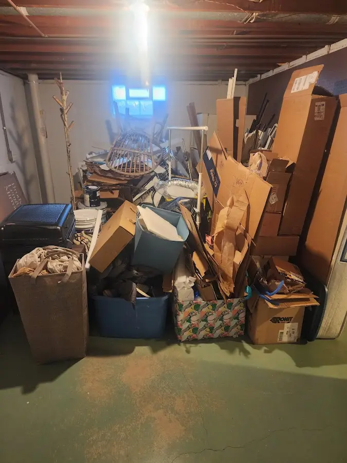 Roll-off dumpster container at job site for Construction Dumpster Rental in South Lyon